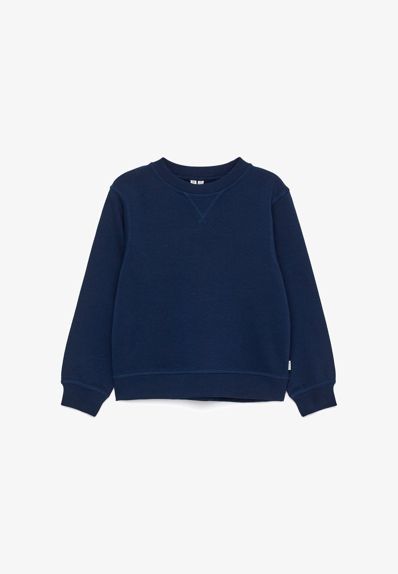 Sweat-shirt bleu marine à manches longues avec col rond, poignets et bas côtelés, avec une petite étiquette en tissu sur la couture latérale.
