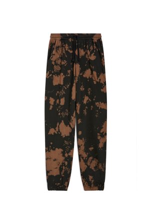 Pantaloni della tuta neri con motivo tie-dye marrone, vita elasticizzata con cordino, tasche laterali e polsini elasticizzati alle caviglie.