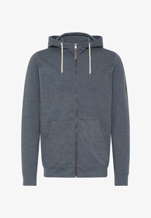 Haut à capuche zippé gris avec une capuche doublée, des cordons de serrage ajustables, des poches avant et des manches côtelées. Présente un petit accent en cuir avec un logo.