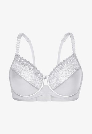 Weißer BH mit einem Spitzeneinsatz im hexagonalen Muster, satinierter Unterseite und verstellbaren Trägern mit dekorativen Akzenten.