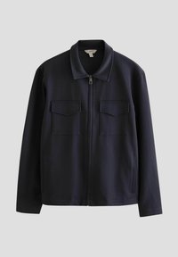Marine blauw zip-up jasje van gladde stof, met twee borstzakken, een staande kraag en zijzakken.
