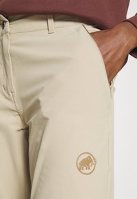 Mammut RUNBOLD ZIP OFF PANTS WOMEN - Hlače za na prostem - savannah