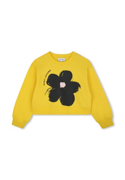Geel cropped sweatshirt van katoen, met een groot zwart bloemenpatroon met een roze midden. Inclusief geribde boorden en halslijn.
