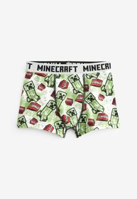 Boxeri scurți din bumbac verde, cu un print cu Creeper din Minecraft și TNT, având un brâu negru cu logo-ul 'Minecraft' și cusături în contrast.