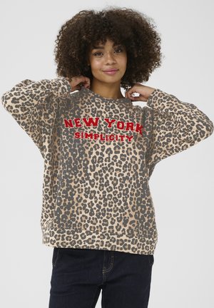 Beige Sweatshirt im Leopardenprint mit rotem "NEW YORK SIMPLICITY"-Schriftzug. Lockere Passform mit rundem Halsausschnitt und langen Ärmeln.