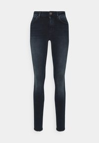 Jeans skinny de denim escuro com cintura alta, apresentando cinco bolsos, fecho de botão e ligeira descoloração nas coxas.