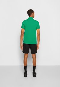 Tommy Hilfiger SLIM - Polo - grassy meadow