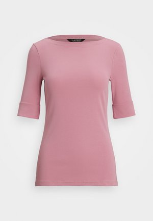 Rosa, kortermet topp med rund hals. Stoffet er glatt og litt stretchy, med oppbrettede ermer for ekstra detaljer.