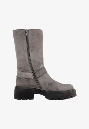Mid-calf grey suede boot with side zipper, strap detail, and thick black lug sole designed for casual wear.