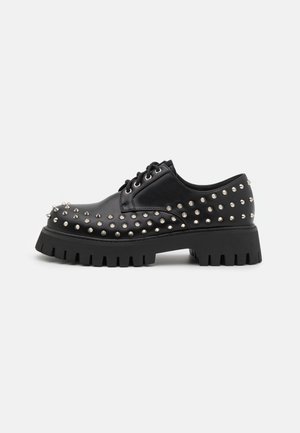 IMMOLATOR - Lace-ups - black
