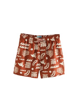 Herren-Badehosen in Rostfarbe mit weißen geometrischen Mustern, darunter Wellen, Vögel und Pflanzen. Elastischer Bund mit Kordelzug.