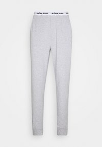 Grijze sweatpants van zacht materiaal, met een witte tailleband met het zwarte "BJÖRN BORG" logo, rechte pasvorm en taps toelopende enkels.
