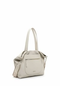 Beige leather handbag with two long handles, a front zip pocket, and a detachable patterned strap. Textured surface adds detail.