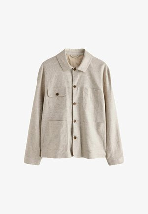 Beige button-up jacket with collar and four front pockets, one with a buttoned flap, made from textured fabric.