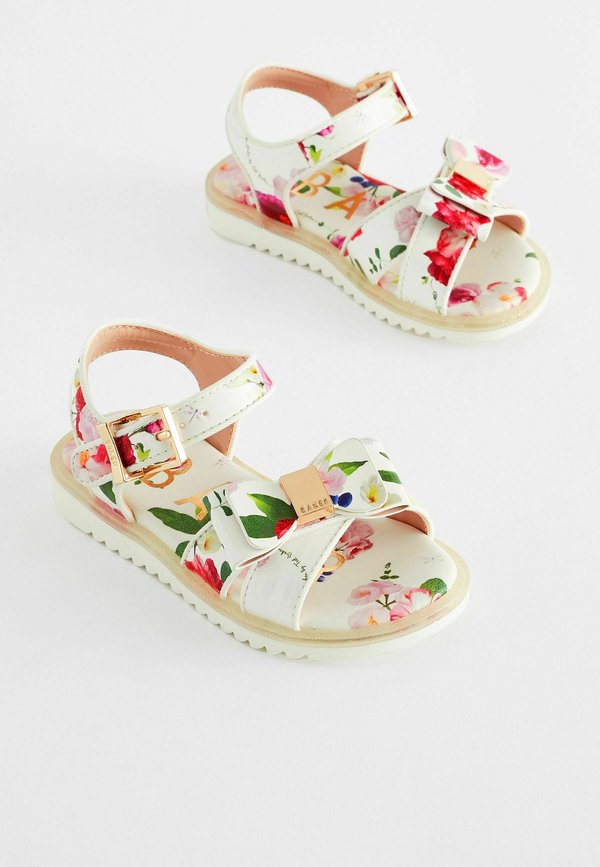 FLORAL PATENT  REGULAR FIT – Lauflernschuh