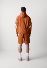 Oakley LATITUDE HOODIE - Jakna iz flisa - ginger
