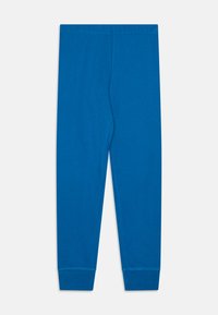 Blaue Leggings aus weichem Baumwollmaterial mit einem elastischen Bund und gesäumten Säumen, ausgestattet mit einer glatten Textur und einem schlichten Design.