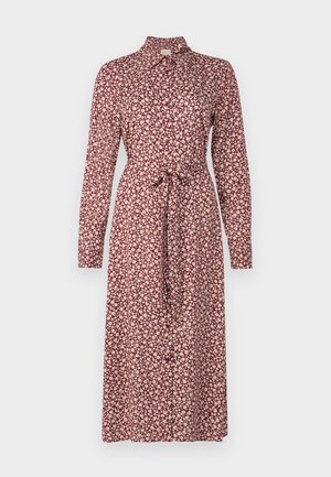 Dolga obleka v burgundski tkanini, ki ima cvetlični vzorec v krem barvi. Pasni trak in podrobnosti o ovratniku. Gladka tekstura, midi dolžina.