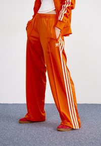 adidas Originals FIREBIRD LOOSE TRACK - Trainingsbroek - orange