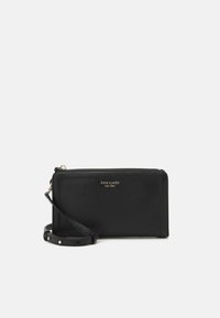 Black leather wallet with a textured surface, featuring a zip closure and a detachable wrist strap. Gold logo plaque on the front.