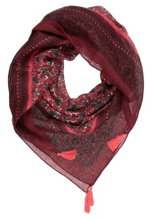 Red scarf with black floral and geometric patterns, featuring triangular shape and three pink tassels at the corners.