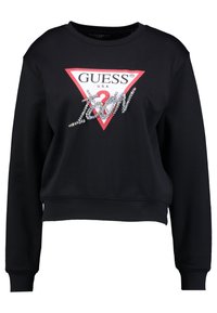 Felpa nera con un grande logo triangolare rosso con il testo "GUESS", decorata con un design di strass argentati "I ❤️ U" sulla parte anteriore.