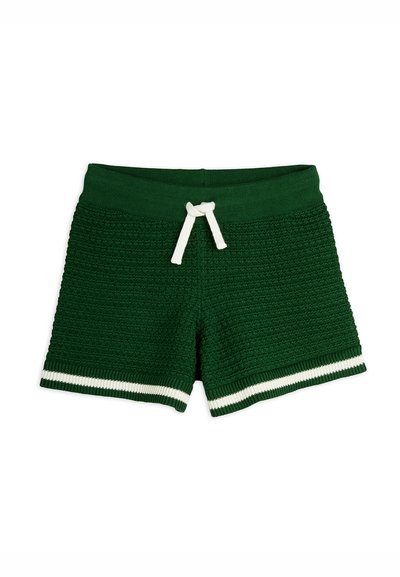 Green knit shorts with a textured surface, white drawstring, and striped white accents at the hem. Casual design, mid-thigh length.