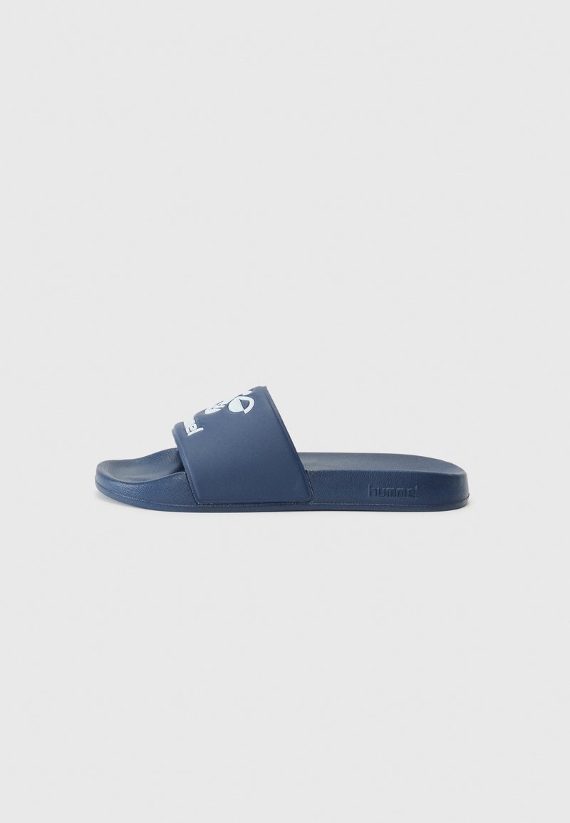 Navy blue slide sandal with a wide strap featuring a graphic logo, made of smooth rubber material. Flat sole for casual wear.