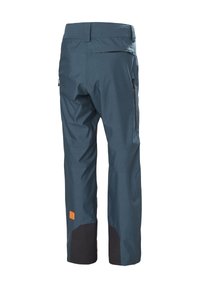 Waterdichte skibroek in donkerblauw met zwarte accenten, elastische tailleband, ritszakken en versterkte onderbenen voor duurzaamheid.