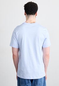 Jordan JUMPMAN FLIGHT TEE - Camiseta estampada - hydrogen blue