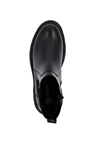 Black leather ankle boot with elastic side panels, rounded toe, and a textured sole. Features a logo on the insole and back pull tab.