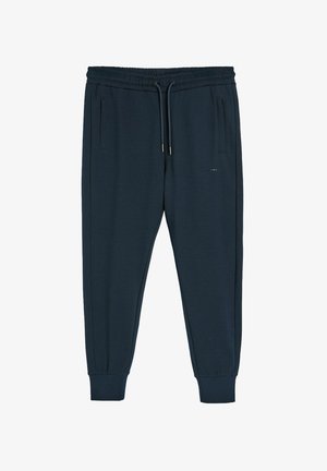 Granatowe joggery wykonane z miękkiego materiału, z elastycznym pasem ze sznurkiem, bocznymi kieszeniami i zwężanymi mankietami.