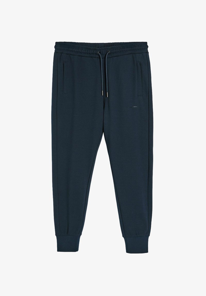 Granatowe joggery wykonane z miękkiego materiału, z elastycznym pasem ze sznurkiem, bocznymi kieszeniami i zwężanymi mankietami.