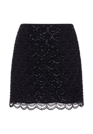 Mini-jupe noire avec motif festonné de sequins et bordure en dentelle le long de l'ourlet, conçue pour une tenue formelle ou de soirée.