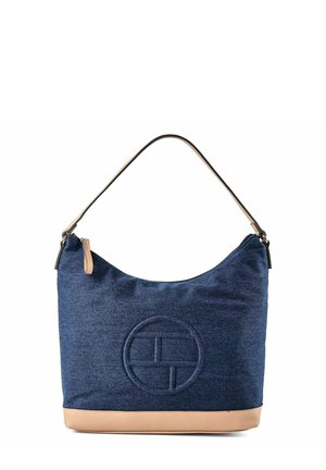 Sac à bandoulière en tissu bleu marine avec base et sangle en cuir beige, arborant un logo circulaire embossé sur le devant.