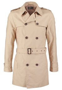 Trench-coat beige à double boutonnage avec ceinture, épaulettes, poignets boutonnés et poches latérales.