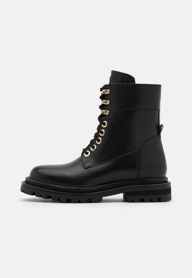Platform ankle boots - nero