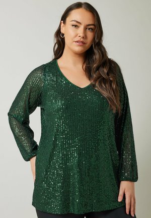 Top de manga larga verde con lentejuelas, escote en V y patrón texturizado. Presenta lentejuelas brillantes y un corte holgado.