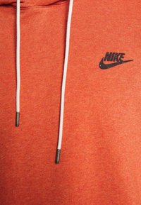 Nike Sportswear Mikina s kapucí - metallic red