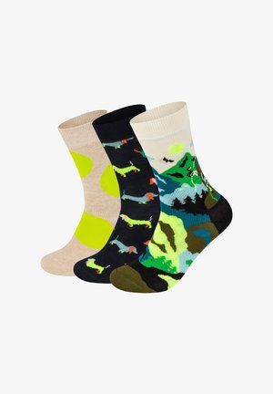 Drei Paar Socken: beige mit gelben Punkten, marineblau mit Dackel-Design und cremfarben mit buntem Berglandschafts-Motiv. Weiches Strickmaterial.