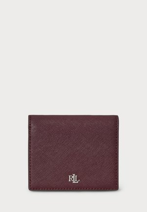 Burgundy leather wallet with a textured finish, featuring a silver logo and minimalist design. Folded for compactness, no visible hardware.
