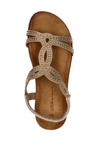 Metallic gold sandal with a flat sole, featuring rhinestone-embellished straps in a looping design and a textured brown footbed.