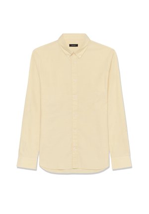 Svetložltá košeľa s dlhými rukávmi vyrobená z mäkkej látky s golierom na gombíky a zapínaním na gombíky vpredu, s oblým lemom.