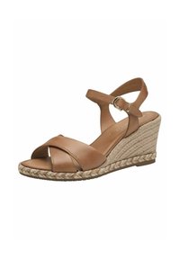 Sandalo con zeppa in pelle marrone, con tacco in jute intrecciato, due cinturini incrociati nella parte anteriore e un cinturino alla caviglia regolabile con fibbia.