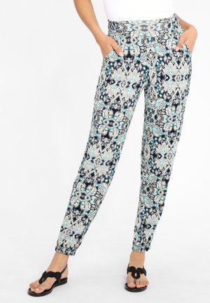 Gemusterte Hose mit hoher Taille und seitlichen Taschen, die ein florales Design in Blau, Schwarz und Cremefarben aufweist, aus leichtem Stoff gefertigt.
