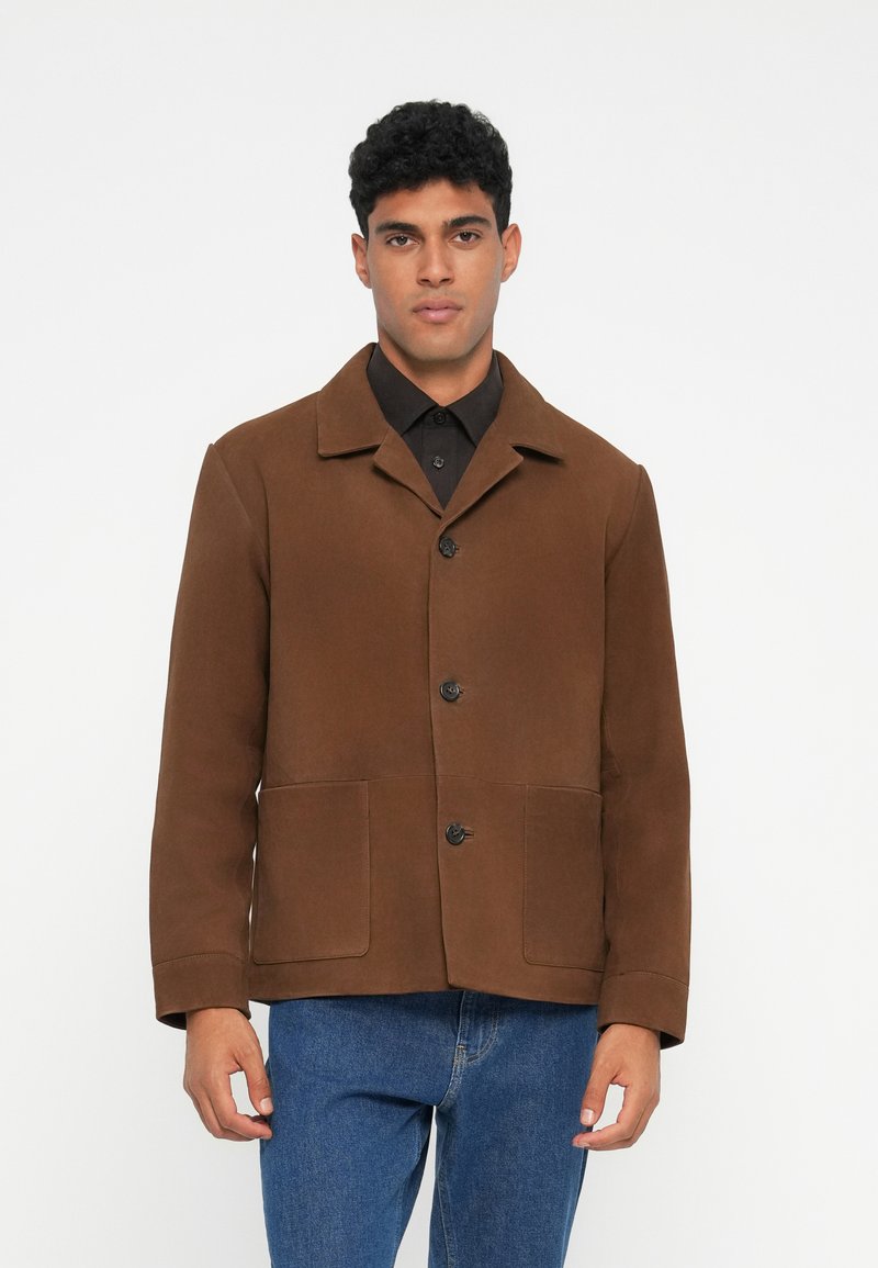 Brown, structured jacket made of a soft fabric. Features a notched collar, front button closure, and two front patch pockets.