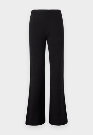 Zwarte flare-broek met een brede pijpen-silhouette, elastische tailleband en een gladde textuur. Geen zichtbare patronen of hardware-details.
