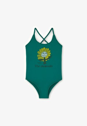 Costum de baie teal cu bretele încrucișate, având un grafic cu o floare zâmbitoare cu petale galbene și textul "Animalele" dedesubt.