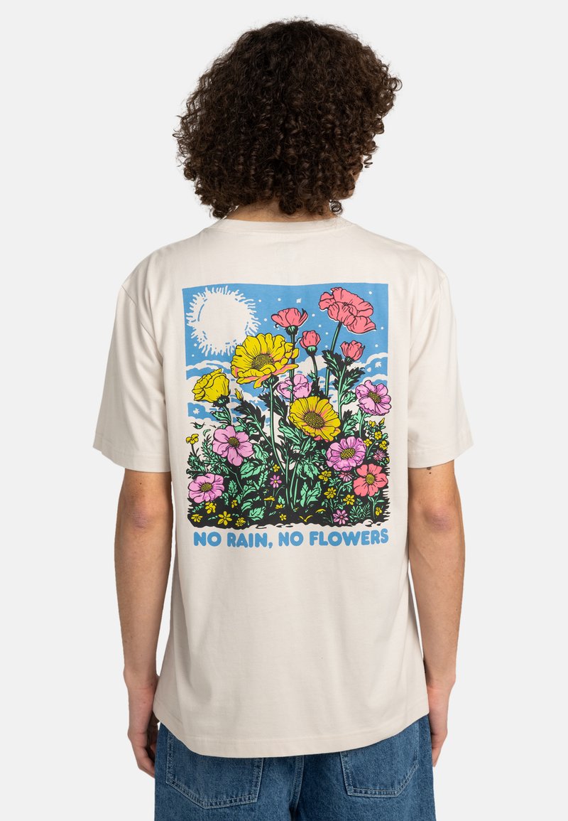 Cream-colored cotton t-shirt featuring a colorful floral graphic on the back, with text "NO RAIN, NO FLOWERS" at the bottom.