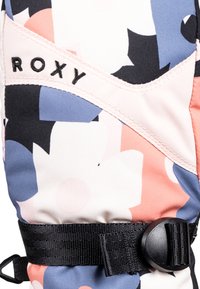 Roxy lyžiarske rukavice s ružovým, modrým a čiernym kvetinovým vzorom, so strapcom a prackou pre bezpečné zapnutie. Mäkká textilná konštrukcia.